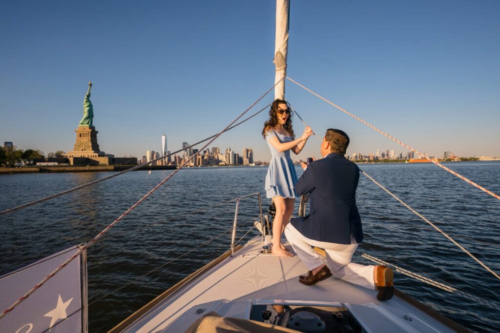 sailing islander proposal statue of liberty